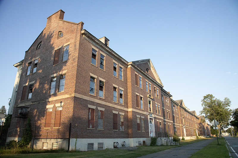 Vacant for three decades, the buildings of Vicksburg Square show signs of decay, including Revere Hall. (Photo by Lisa Aciukewicz)