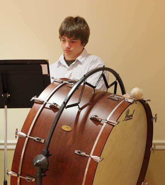 Bromfield freshman Jarrod Revane jumps in on percussion.