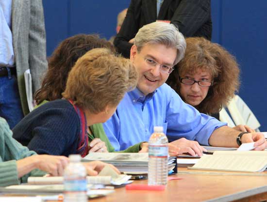 From left: Finance Committee members Alice von Loeseke, Marie Fagan, Rudy Minar, and Laura Vilain chat before the meeting begins.