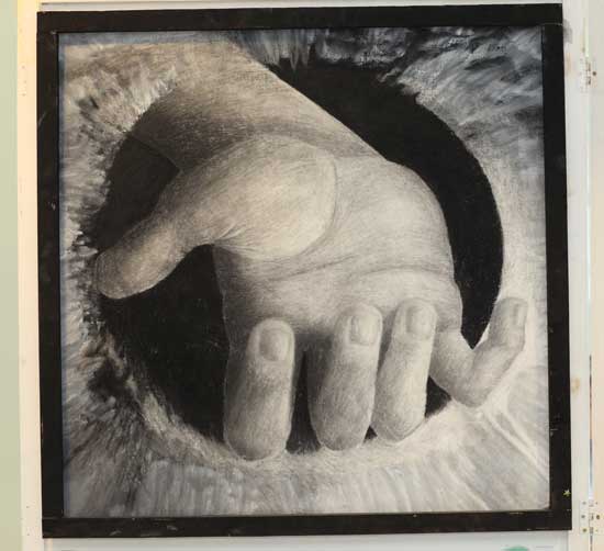 Bromfield junior Jared Gallivan’s 3-foot by 3-foot charcoal drawing of his hand, drawn from observation.